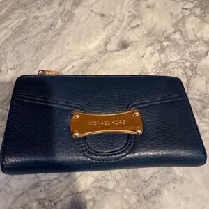 Excellent condition navy blue Michael Kors wallet.